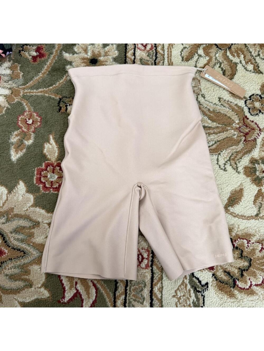 SKIMS Zoned Mid Rise Shorts in Clay